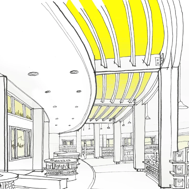 Roof glazing distributes diffuse daylight throughout the interior.